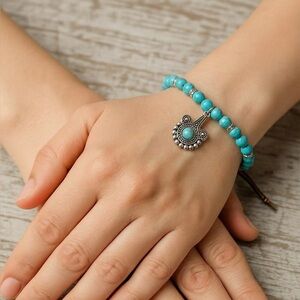 Turquoise Beaded Bracelet with Silver Charm